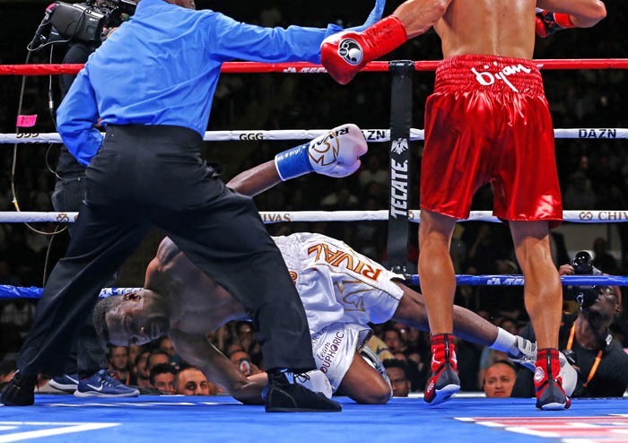 Jun 8, 2019; New York, NY, USA;   Steve Rolls falls to the canvas after being knocked out by Gennadly Golovkin  during the fourth round of their super middleweight fight at Madison Square Garden.