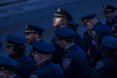 Police officers gathered for the wake of New York City Police Officer Wilbert Mora at St. Patrick's Cathedral, Tuesday, Feb. 1, 2022, in New York. Mora and Officer Jason Rivera were fatally wounded when a gunman ambushed them in an apartment as they responded to a family dispute.