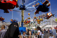 Luna’s Rides  -  People enjoy the rides in Luna Park on a summer afternoon in Coney Island. Sunday 07 10 2022  Brooklyn, NY.