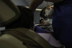Danielle watches Malcolm have his teeth cleaned. Although Malcolm’s school has specialized dentists on campus, she drives almost an hour out of her way to see a particular doctor. Danielle says Malcolm sees so many doctors, continuity of care is crucial, and this doctor allows both kids to be seen at the same time allowing her to save time on her daily routine. December 6, 2020. Rochester, NY.