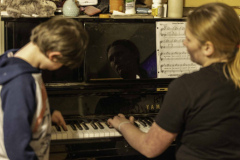 Boston becomes frustrated with Malcolm as he presses random keys while she practices for her upcoming Christmas piano recital. 12.7.22. Rochester, NY.