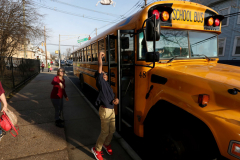 Upon hearing that masks are now optional in school a student tosses his mask in the air. Masks were optional during the school day at Abraham Lincoln school in Elizabeth, N.J. March, 7, 2022