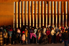 Migrants cross U.S.-Mexico border
