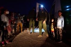 People cross into the U.S. through gap in the border wall in Yuma