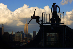 Skateboarders in Front of the Empire State Building