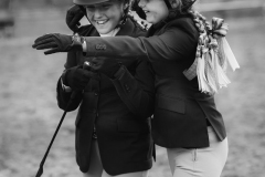 EQUESTRIAN DREAMS - After COVID put a damper on the competitions of previous years, the Chicory Meadow Farm IEA (Interscholastic Equestrian Association) team, compared to the Bad News Bears because the team often lost, was unusually diverse and even included a boy, weren’t on to win some of the top prizes by the end of the season. Mandy embraces teammate Harper when Harper won a first place ribbon when Chicory Meadow Farm competed in the IEA Hunt Seat Show Sunday, September 25, 2022 at Meadow Creek Farm in Pleasant Valley, NY.