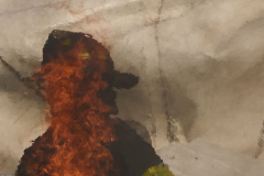 Heavy fire shoots out as a  firefighter conducts vertical ventilation during a five alarm fire at UFC GYM at 89 Boerum Place in Boerum Hill, Brooklyn on March, 14,2022.