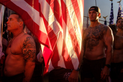 JERSEY CITY, NJ USA - AUGUST 19, 2023 -  Participants stand while waiting to start while inside the 9/11 Empty Sky Memorial in Liberty State Park. The 6th annual Navy Seal Foundation New York City Seal Swim.
