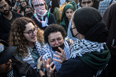 A pro-Palestinian protestor breaks down while shouting at pro-Israeli protestors as the two sides faced off against each other in Washington Square Park in New York City Oct. 17, 2023. Dozens of New York City police officers created a barrier between the two sides, which numbered well into the hundreds.