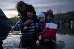 Migrants cross the Rio Grande from Piedras Negras, Mexico, to Eagle Pass, United States, on Christmas Day. 25 December, 2023. The majority of the group of hundreds were of Venezuelan nationality.