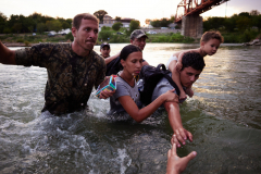 Migrants detained after crossing U.S.-Mexico Border