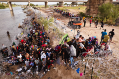 Migrants cross U.S.-Mexico Border