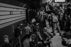 People stand on subway tracks as they protest the death of Jordan Neely at Lexington Av/63 St subway. Manhattan, New York. 06 May 2023.