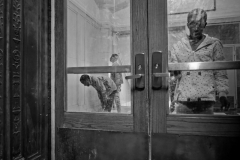 July 31, 2023.  Prayer inside the door to the Grand Central Station. Newly arrived migrants at the Roosevelt Hotel last night. The hotel is an intake site.