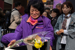 Lee Hyo-suk, mother of Jeong Ju-hee, a victim of the 1029 Itaewon Crowd Crush Disaster, cried as she approached a memorial built to remember the victims of the 1029 Itaewon Crowd Crush Disaster that happened last year at the alley, in Seoul, South Korea, on Oct. 26th, 2023.