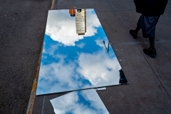 Mirrored glass laying on a sidewalk in the Upper West Side reflects the weather of the day Friday, Jan. 27, 2023, in Manhattan.