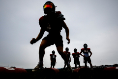 Saucon Valley High School football players take turns running through drills during a practice on Aug. 10, 2023.
