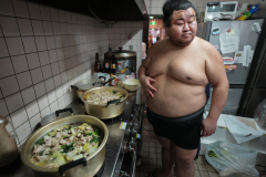 A hungry sumo player prepared lunch  for the participants who were invited to Miyagino stable at the stable in Tokyo, Japan on Feb. 11th, 2023.