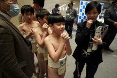 Young competitors prayed before their round at Hakuhō Cup, a sumo competition for elementary and middle school students at Ryōgoku Kokugikan in Tokyo, Japan on Feb. 12th, 2023.