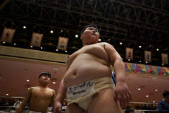 A Mongolian player with the pictures of former Sumo Yokozuna (champion) in the background during Hakuhō Cup, a sumo competition for elementary and middle school students at Ryōgoku Kokugikan in Tokyo, Japan on Feb. 12th, 2023.