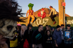 BROOKLYN, NY USA - OCTOBER 26, 2024 -  People hang out and party during the 20th Annual Bike Kill held in Red Hook. The event is a party with mutant bikes where a Mad Max vibe is present.