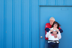 People wait for Republican presidential nominee former President Donald Trump to speak during a campaign rally at Dodge County Airport, Sunday, Oct. 6, 2024, in Juneau, Wis.
