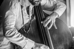 Jazz musician Keenan Zach performs on Double Bass during the Wednesday night open jam session at the Jazz Loft in Stony Brook on the evening of June 26, 2024.