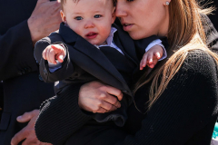 Stephanie, wife of Jonathan Diller, holds her son Ryan at the funeral of her husband, NYPD police officer Jonathan Diller, held at St. Rose of Lima Roman Catholic Church in Massapequa, Saturday, March 30, 2024.