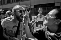 April 15, 24 Angry shouting by supporters of Israel on left and Palestine on right at the New York Stock Exchange protest.  NYC