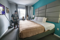 Migrant Julio Zambrano, with his two sons Julio, 9, and Joseph, 6, arrived at Canal Loft a hotel in Chinatown in New York City, Thursday, Jan. 4, 2024 after a long 2 months journey from Guatemala.