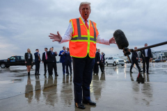 Republican presidential nominee former President Donald Trump talks to reporters at Green Bay Austin Straubel International Airport, Wednesday, Oct. 30, 2024, in Green Bay, Wis.
