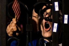Pro-Israel supporters gather outside Columbia University's locked gates to confront student demonstrators encamped on campus in New York, NY on April 25, 2024.