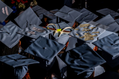 Edward Lopez's graduation cap, decorated with zip-ties and a piece of the broken Hamilton Hall door from the night students barricaded themselves inside the building, is seen among fellow graduates during Columbia University's Journalism School graduation ceremony on May 15, 2024 in New York City. Police arrested nearly 100 people as they cleared Columbia University of pro-Palestinian demonstrators.