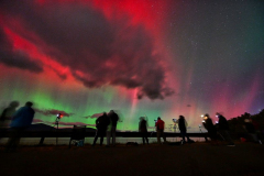 Northern LightsPhotographers gather around the Ashokan Reservoir in the Catskills as the green and red Northern Lights dance across an Autumn sky.An unusually strong magnetic storm led to Aurora sightings as far south as Florida, an almost never occurring event.