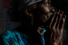 Marjorie Eliot, 87, poses for a portrait after one of her weekly free jazz shows in her home. Marjorie began holding these shows in 1992 with her son as a way to cope with the loss of one of her other sons.