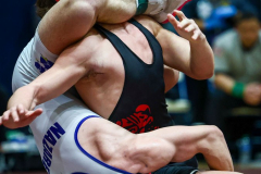 Nazareth’s Brayden Zuercher (white) makes a move on Easton’s Justin Cosover at 172 pounds during the District 11 Class 3A individual wrestling finals on Feb. 24, 2024.