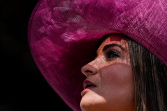 A spectator watches the seventh race of the day before the 156th running of the Belmont Stakes horse race, Saturday, June 8, 2024, in Saratoga Springs, N.Y.