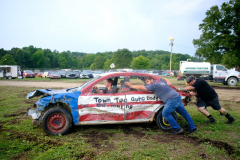 Demolition Derby Days The annual Demolition Derby held at the  NJ State Fair at the Sussex County Fairgrounds in Augusta AUGUSTA, NJ USA - AUGUST 5, 2024 -  Logan Benner, a NJ native now residing in Sarasota, FL, has his friends push back to his pit area after the car had problems starting. The second night of the Demolition Derby.