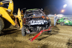 AUGUSTA, NJ USA - AUGUST 5, 2024 -  A car is carried out of the arena after being destroyed. The second night of the Demolition Derby at the NJ State Fair held at the Sussex County Fairgrounds in Augusta.