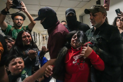 1st Place: Dean Moses – amNewYork- Tom Away - A teenage girl and her siblings are pried from their father by ICE agents as they move to arrest him. The federal supervisor pulls her away and looks at her with disgust as she cries and begs for her father. The sounds of her screams reverberated through the hallways and the ears of everyone who heard them at 26 Federal Plaza.