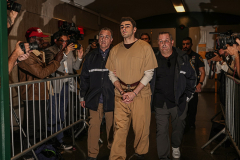 2nd Place: Dean Moses – amNewYork- The Mangione Effect - Accused Midtown assassin Luigi Mangione is led through the hallways of criminal court in handcuffs surrounded by press photographers hungry for a photo.
