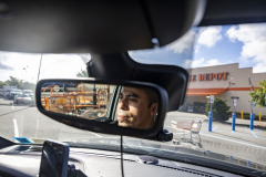 EA: Alejandra Villa Loarca- Newsday – Ice Watch - Osman Canales sits in his car in Huntington Station on Wednesday, Sept. 3, 2025. Canales, an activist, conducts “ICE watches,” tracking immigration enforcement activity and informing immigrants of their rights in Spanish.