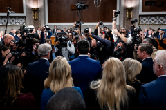 Photojournalists photographing Pete Hegseth (in blue suit in the middle) at his Senate Armed Services Committee nomination hearing at the U.S. Capitol on Tuesday, January 14, 2025.