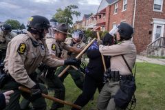 Illinois State Police detain a person after declaring an unlawful assembly outside the U.S. Immigration and Customs Enforcement facility in Broadview, Ill., Saturday, Oct. 11, 2025.