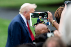 President Donald Trump speaking with reporters after leaving the Oval Office at the White House in Washington, D.C. on Friday, August 1, 2025.