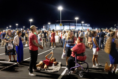 HM: Aristide Economopoulos -Independent- Memorial for Charlie Kirk
 - On September 10, 2025, right-wing political activist and Turning Point USA co-founder Charlie Kirk was killed by a gunman in Utah while attending a debate at Utah Valley University. Eleven days later, a public memorial was held at State Farm Stadium in Glendale, AZ, drawing nearly 100,000 attendees, including President Trump and various political and religious dignitaries. The event, which began as a spiritual service honoring the activist, shifted into a political rally focusing on Christian nationalist values.
GLENDALE, AZ USA - SEPTEMBER 21, 2025 -  Early in the morning people wait to enter State Farm Stadium. The memorial wouldn’t start for another 6 hours.