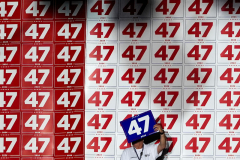 A supporter holds a sign as Republican presidential nominee former President Donald Trump speaks during a campaign rally at Greensboro Coliseum, Tuesday, Oct. 22, 2024, in Greensboro, N.C.