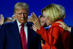 Republican presidential nominee former President Donald Trump closes his eyes as Pastor Paula White and other faith leaders pray over him, during the National Faith Summit at Worship With Wonders Church, Monday, Oct. 28, 2024, in Powder Springs, Ga.