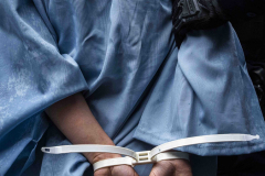 A Columbia alumni is detained by New York City Police Department (NYPD) officers outside Columbia University’s graduation ceremony, in New York City, May 21 2025.