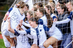 Double Overtime Jubilation - SOMERSET, NJ USA, November 23, 2025  - Chatam’s Sophie D’Egidio (10 center) is pinned by teammates against the goal’s net as they celebrate Alex Donoghue’s (24 left) game-winning double overtime goal to beat Shawnee 3-2 during the NJISAA Girls Soccer Group 3 state final.